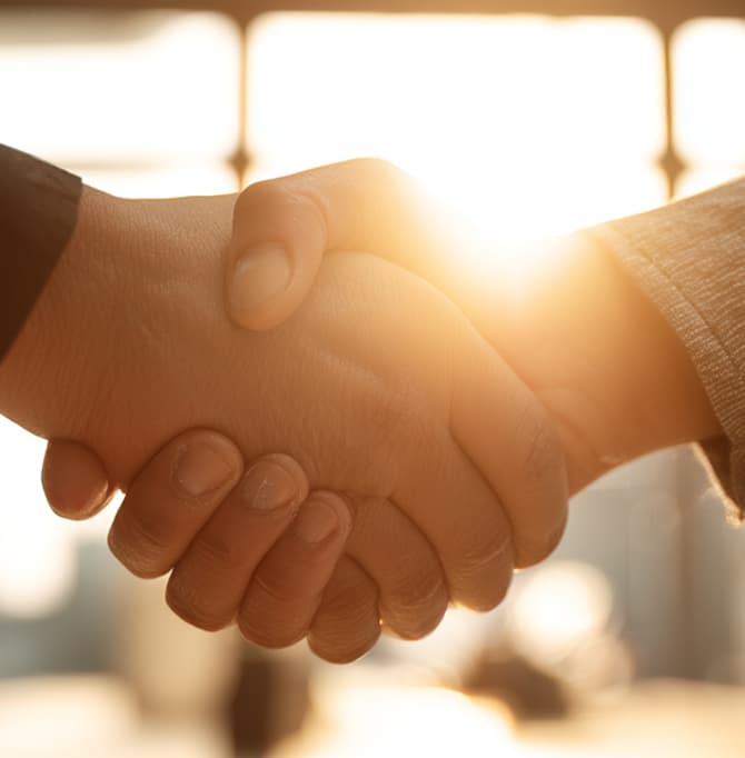 Handshake symbolizing trust, partnership, and successful commercial lending relationships